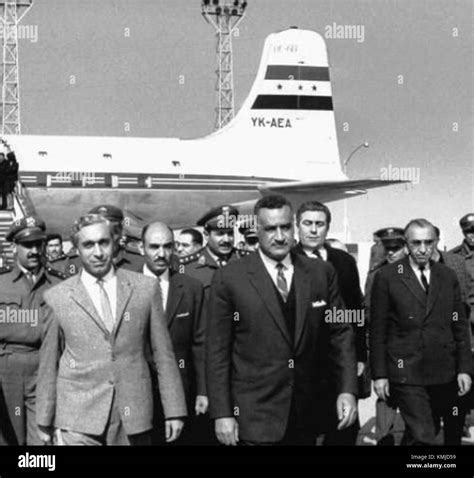 President Amin al-Hafez at Cairo Airport in August 1963 being greeted ...