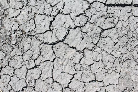 Dry Ground with Gray Cracks Stock Image - Image of arid, surface: 155576027