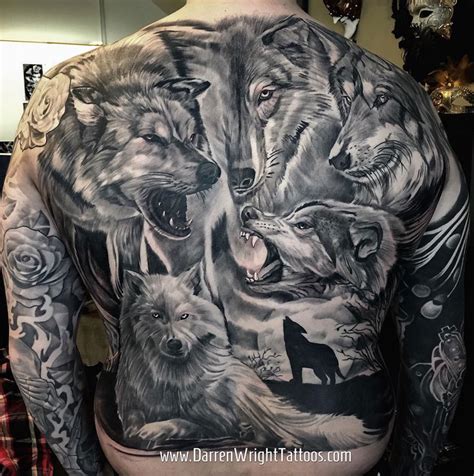 Wolves Covering Guy's Back | Best tattoo design ideas