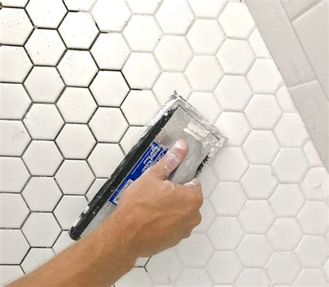 large hexagon backsplash with very light grey grout - Google Search in 2020 | White bathroom ...