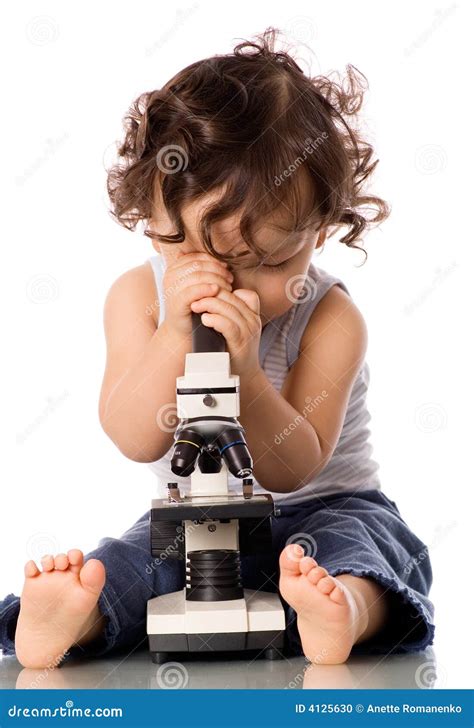 Baby With Microscope. Stock Photo | CartoonDealer.com #4125630