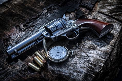 Timeless Tension: A 4K Ultra HD Wallpaper of Firearm and Pocket Watch