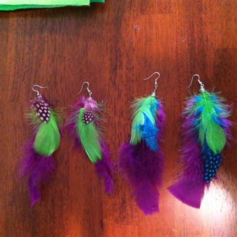 Homemade feather earrings! So easy, just hot glue and use jewelry wire ...