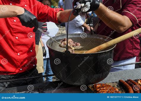 Very Large Cauldron Cooking Food during Campfire. Cooking in a Pot on ...