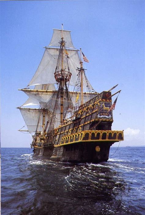 an old fashioned pirate ship sailing in the ocean