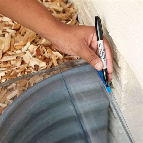 How to Install a Window Well Cover | Lowe's | Window well cover, Window well, Basement window ...