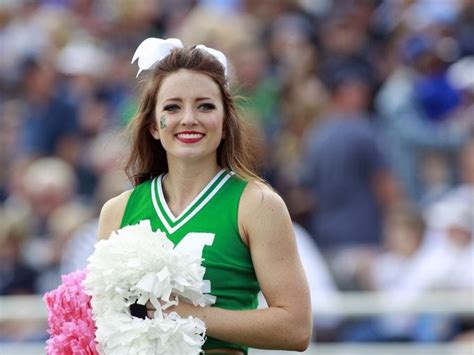 Spirited NCAA football cheerleaders around the country