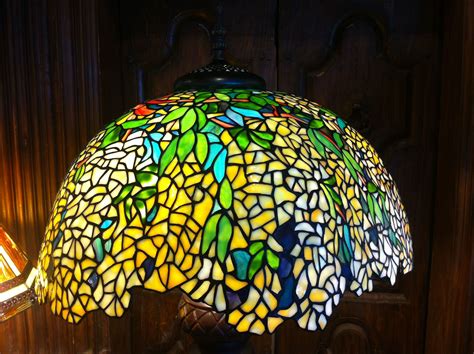 A beautiful Wisteria Style Tiffany Lamp. This shade is dramatic and would light up any room ...