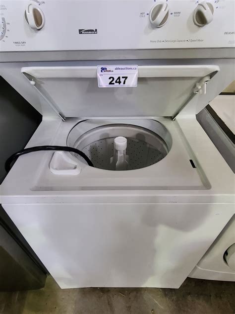 KENMORE STACKED WASHER/DRYER MODEL 970-C94702-00 - Able Auctions