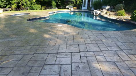 Stamped concrete pool deck sealed with a Foundation Armor concrete sealer. The Foundation Armor ...