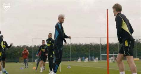 Arsenal training footage reveals Ben White's new look and absent stars ...