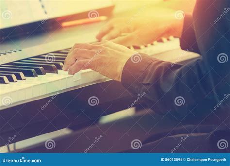 Pianist Hands Playing Piano in a Outdoor Concert with Sun Flare Stock ...