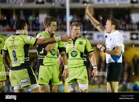 Bath, UK. 02nd May, 2014. Northampton Saints players remonstrate with referee Matthew CARLEY ...