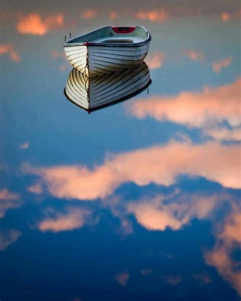 Boat in the sky | Reflection photography, Photo, Amazing photography