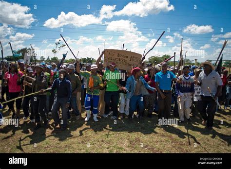 CARLETONVILLE, SOUTH AFRICA: Hundreds of striking gold miners gather at Goldfields KDC West Mine ...