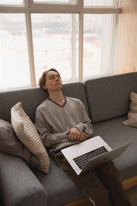 Photo Of Man Sleeping On Couch · Free Stock Photo