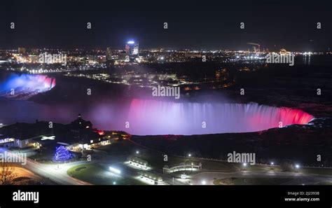 An aerial view of the Niagara Falls at night with lights Stock Photo ...