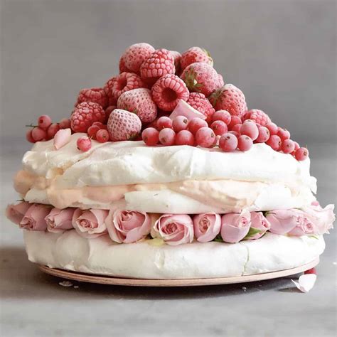 Pavlova Cake With Coconut Cream and Berries (Meringue Cake) - Alphafoodie