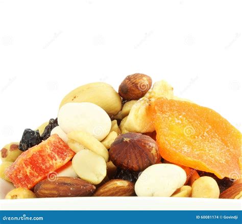 Mixed Dried Fruits Nuts Trail Mix Closeup In White Background Stock Photo - Image of food ...