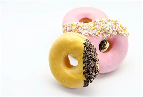 Premium Photo | Colorful donuts with sprinkles