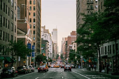 HD wallpaper: A busy street in New York with a traffic intersection in the background ...