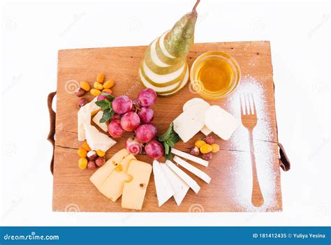 Cheese Platter on a Wooden Board on a White Background Stock Image - Image of italian, grocery ...