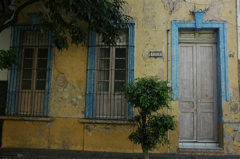 Windows and door, yellow walls - blue trim - weathered and… | Flickr