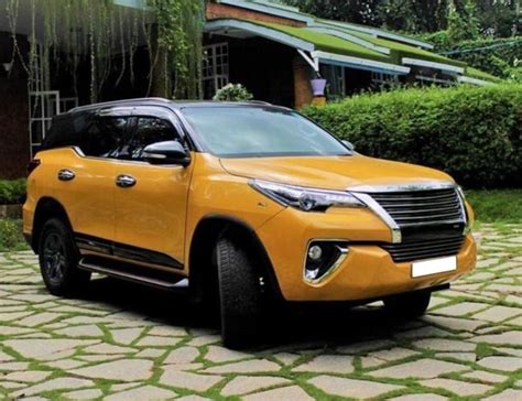 This Modified Toyota Fortuner With Black & Yellow Exterior Looks Majestic