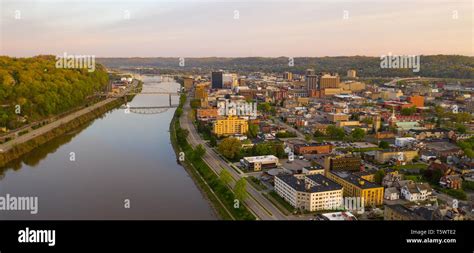 Sunrise reflects in the Kanawha River slowly flowing by picturesque ...