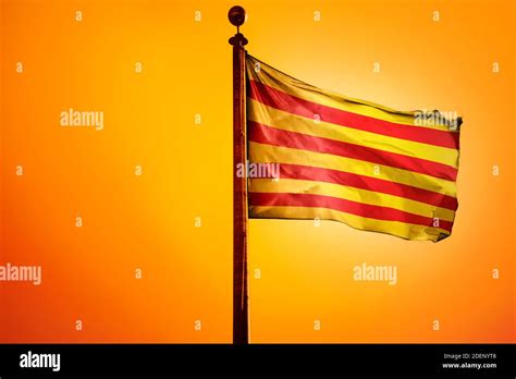 Catalonia Flag, Flag waving with Sunrise Stock Photo - Alamy