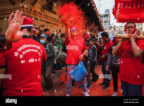 Kathmandu, Nepal. 11th Nov, 2022. A man hurls vermillion colors in the ...