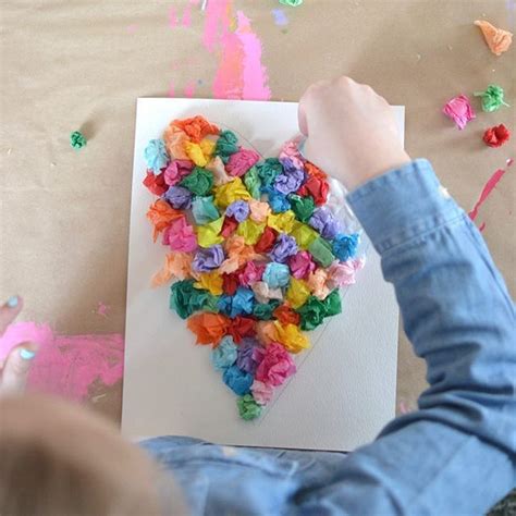 scrunching up little pieces of tissue paper for this 3D heart ...