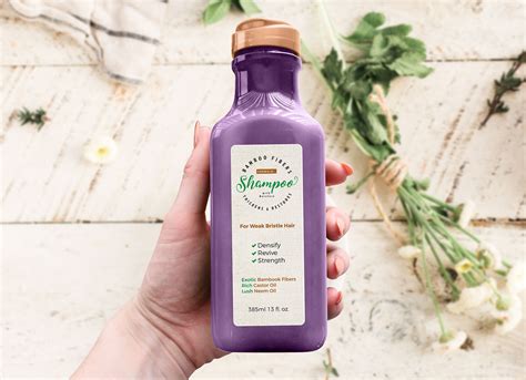 Free Hand Holding Natural Shampoo Bottle Mockup PSD - Good Mockups