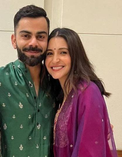 Anushka Sharma glows in pink as she poses with hubby Virat Kohli at Team India's Diwali bash ...