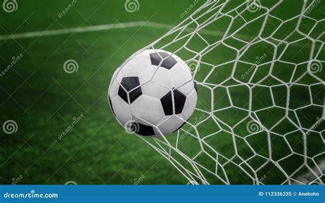 Soccer Ball on Goal with Net and Green Background Stock Image - Image of play, outdoors: 112336335