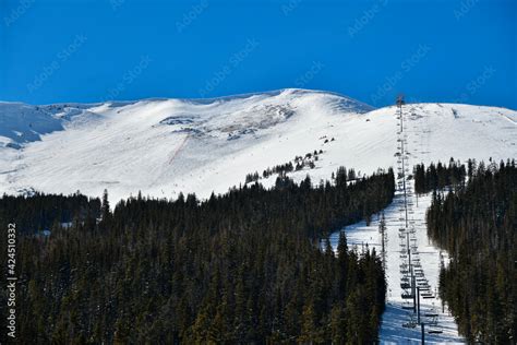 Chairlift to peak 6 on snowy hill at Breckenridge Ski resort at ...