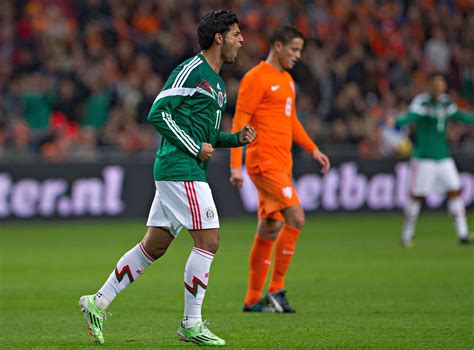 Carlos Vela of Mexico celebrates after scoring his team's first goal ...