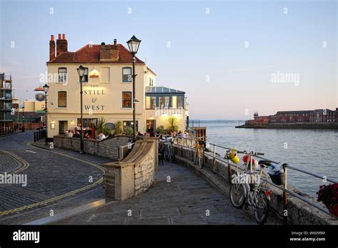 The Still and West pub by the entrance to Portsmouth harbour on a summers evening, Hampshire ...