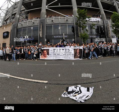 A Newcastle United shirt lies in the road as fans protest outside St ...