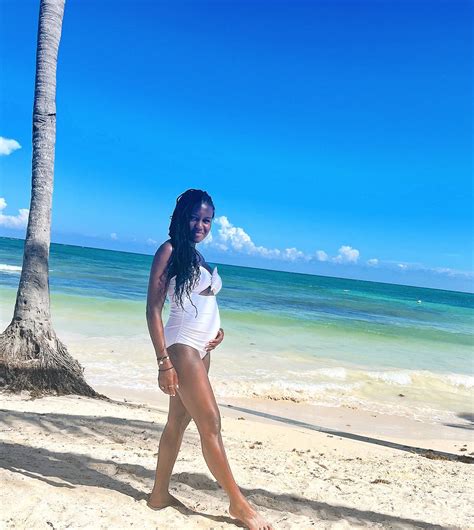 GMA's pregnant Janai Norman shows off baby bump in low-cut white ...