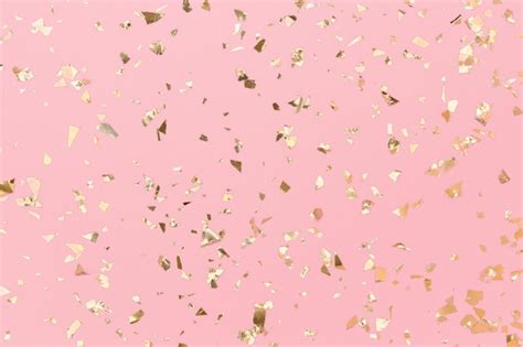 Premium Photo | Gold confetti sparkles on pastel pink background ...