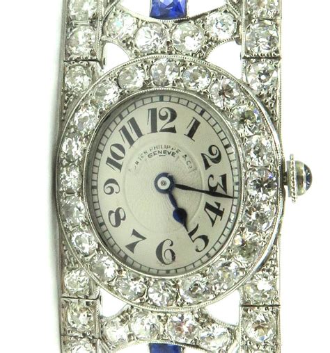 Patek Philippe Platinum Diamond Sapphire Bracelet Wristwatch at 1stDibs