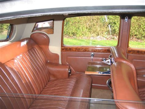 the interior of an old car is clean and ready to be used as a living room