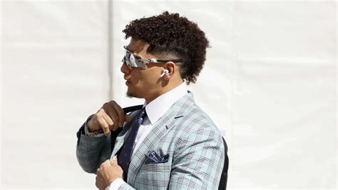 Patrick Mahomes Suits Up in Plaid & Oakley for Super Bowl 2023 Arrival