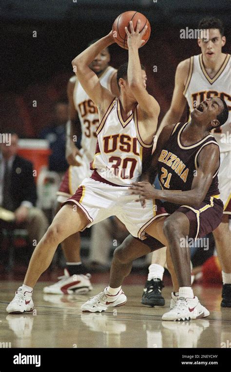 University of Southern California guard Cameron Murray fouls Arizona ...