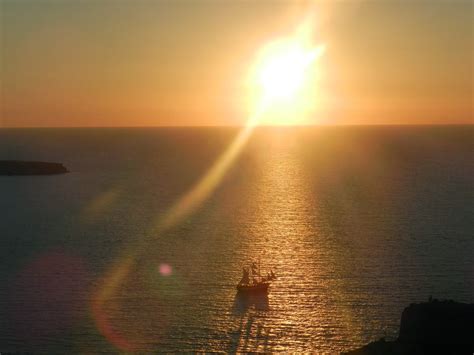 CHINAR SHADE : SUNSET VIEWS OF SANTORINI IN GREECE