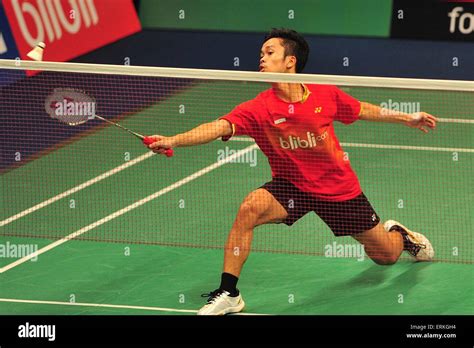 Jakarta, Indonesia. 4th June, 2015. Anthony Ginting of Indonesia returns the shuttlecock to K ...