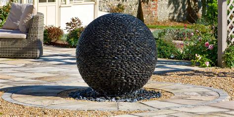 Stone Sphere Water Feature | Water Fountain Ball of Black Pebbles