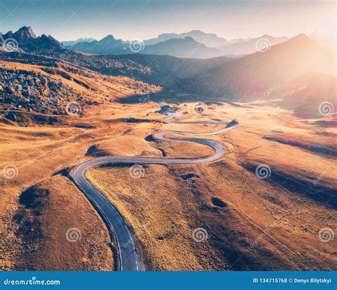 Winding Road in Mountain Valley at Sunset in Autumn. Aerial View Stock Photo - Image of fall ...