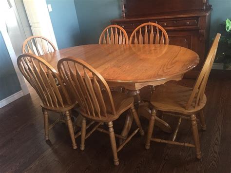 Solid oak oval dining table and 6 chairs Summerside, PEI